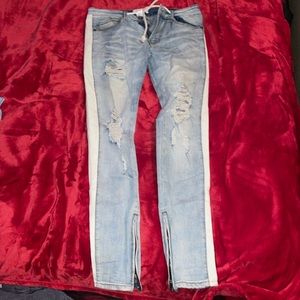 Fashion nova ripped jeans with white stripe on side